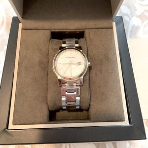 Burberry sapphire crystal, Swiss made watch, stainless steel women’s brand new.